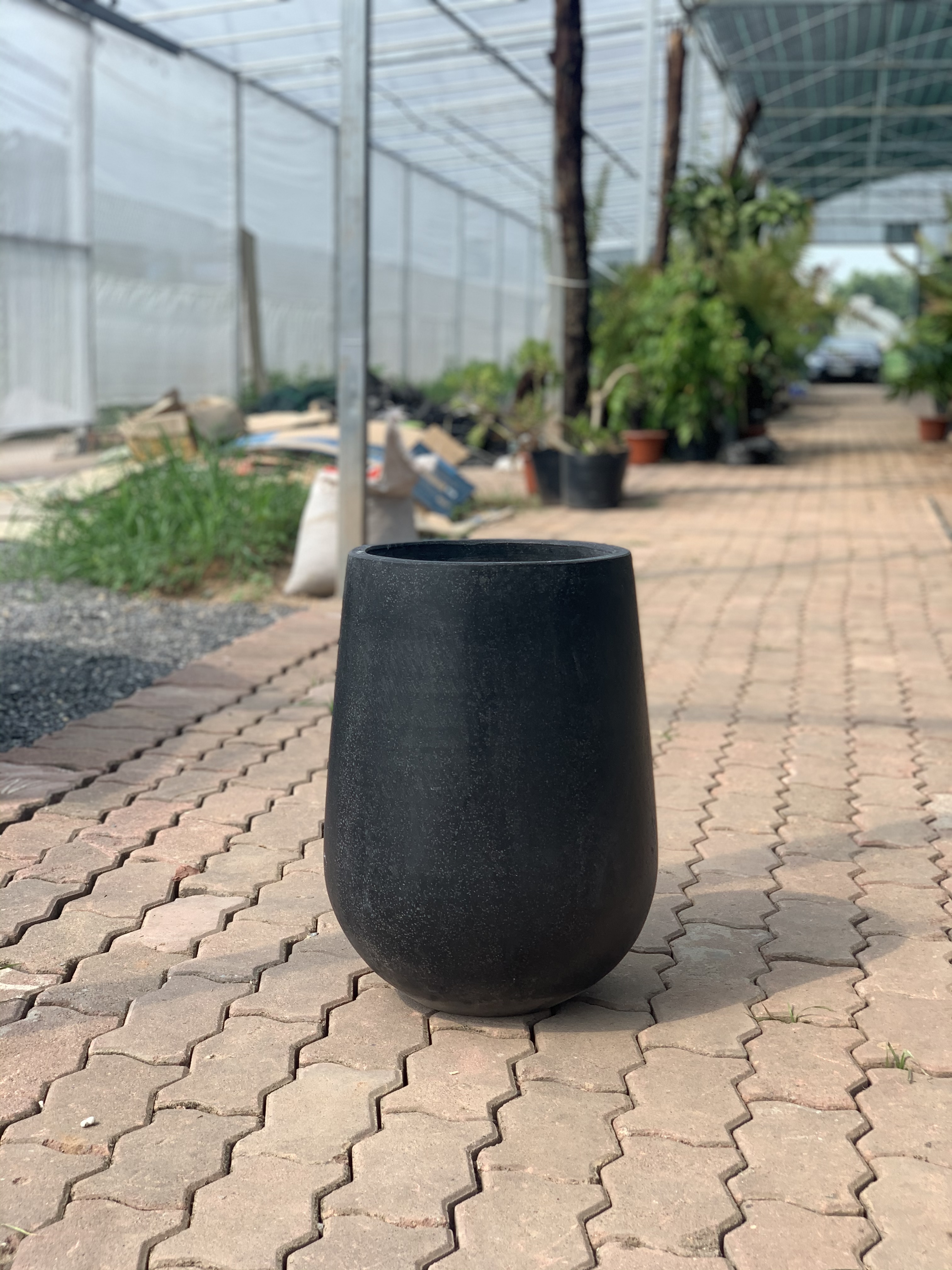 Chậu Xi Măng Đá Mài Hình Giọt Nước mang lại sự sang trọng trong không gian