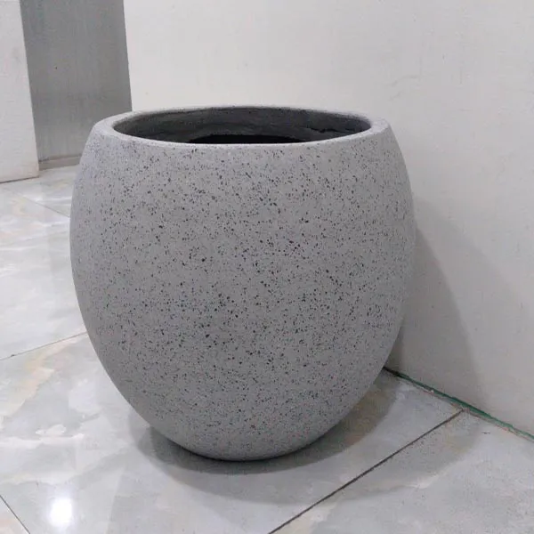 Chậu xi măng đá mài trái banh có đường kính 40 và chiều cao 40cm